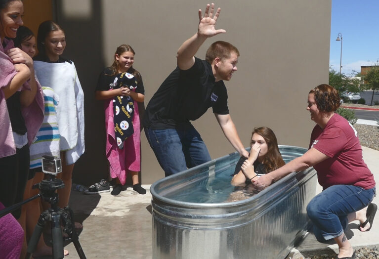 a80df58b b0fe 477a 890d 87ee86159d6b Trey Van Camp baptizing