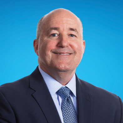 Larry Taylor Headshot on ACSI Blue