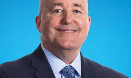Larry Taylor Headshot on ACSI Blue