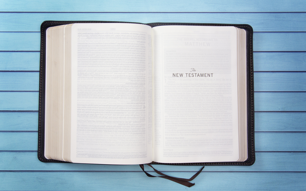 A Bible on a Wooden Table Set out for a Personal Bible Study