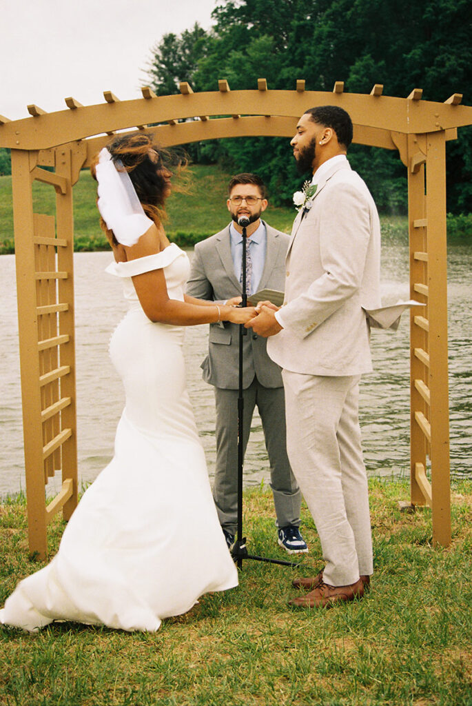 Mark Page officiates the wedding of pro basketball player, Riqco Burrus, and his bride, Jaelynn Murray. Burrus has found a family in the Gospel Hoops Network community, while his wife is the Assistant Director of Video and Recruiting Operations for the UNC Women’s Basketball team.