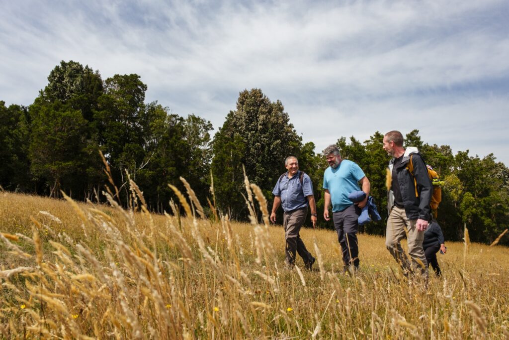 IMB missionary Landon Williams walks with a Chilean pastor and a U.S. pastor on a remote island in Chile